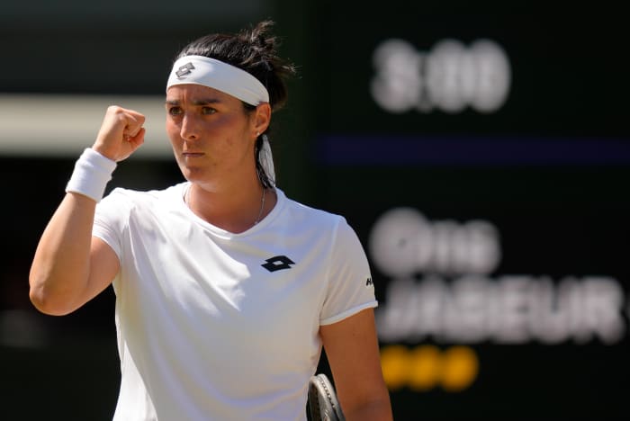 Ons Jabeur celebrates after advancing at Wimbledon